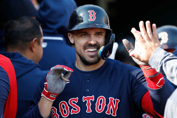 Apr 8, 2023; Detroit, Michigan, USA; Boston Red Sox center fielder Adam Duvall (18) receives congratulations from teammates after he hits a three run home run in the third inning against the Detroit Tigers at Comerica Park.